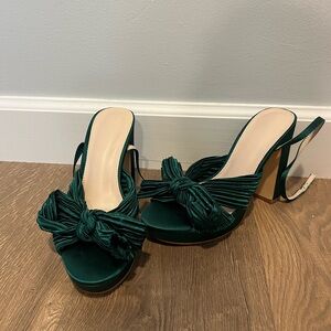 Green bow heels.